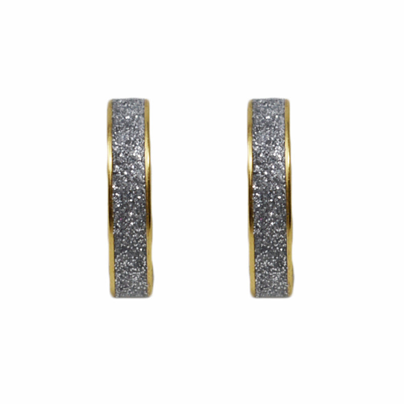 These beautiful handmade earrings are filled with fine goat leather set in antiqued 24k gold plated brass. Both the posts and clutches are made of surgical steel and are hypoallergenic. Nickel free.